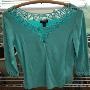 Turquoise colored knit top